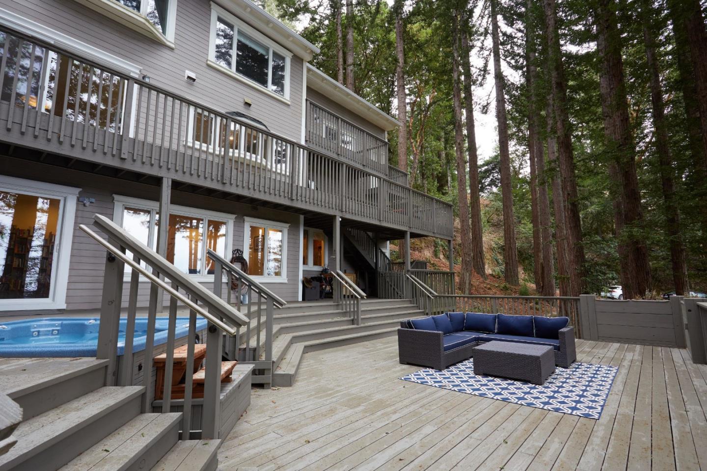 234 Swett Road Woodside, CA 94062 - Photo 18 of 20 a view of a house with a deck