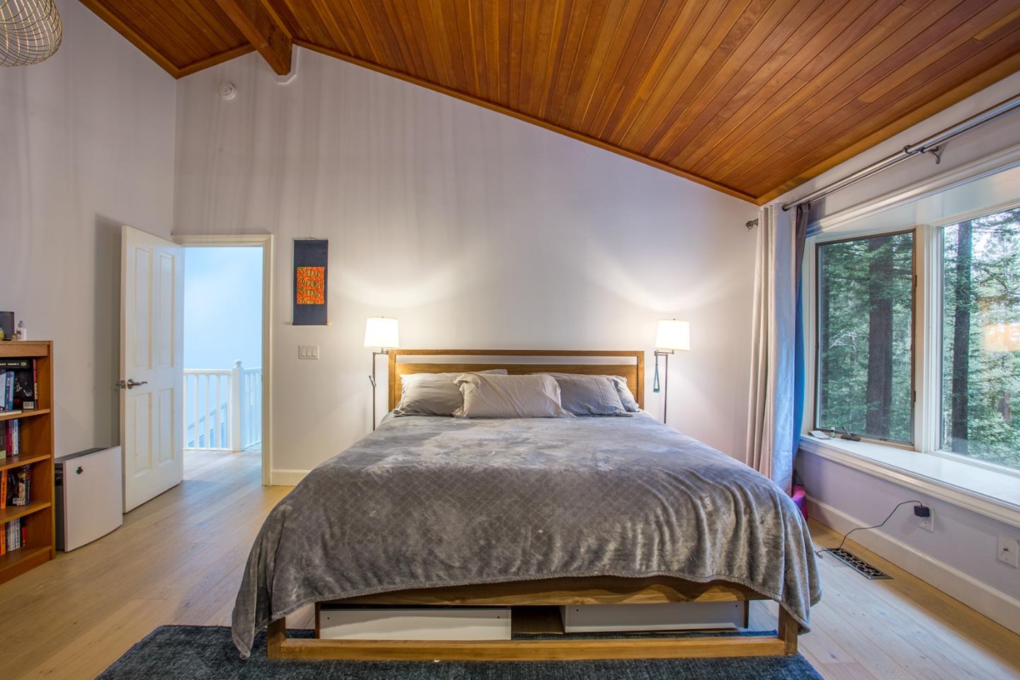 234 Swett Road Woodside, CA 94062 - Photo 10 of 20 a bedroom with a bed and large window