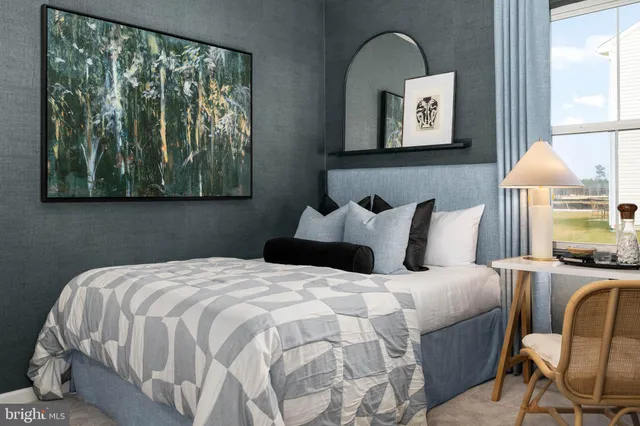 a kitchen with a dining table chairs and refrigerator
