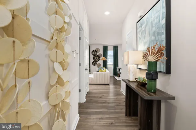 a bedroom with bed and a night stand