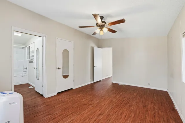 a view of a house with a yard and garage