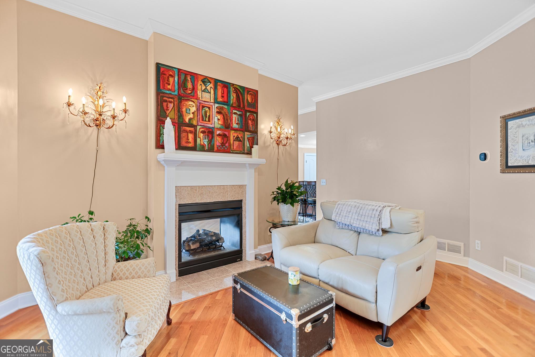 643 Old Greenville Road Fayetteville, GA 30215 - Photo 13 of 59 a living room with furniture and a fireplace