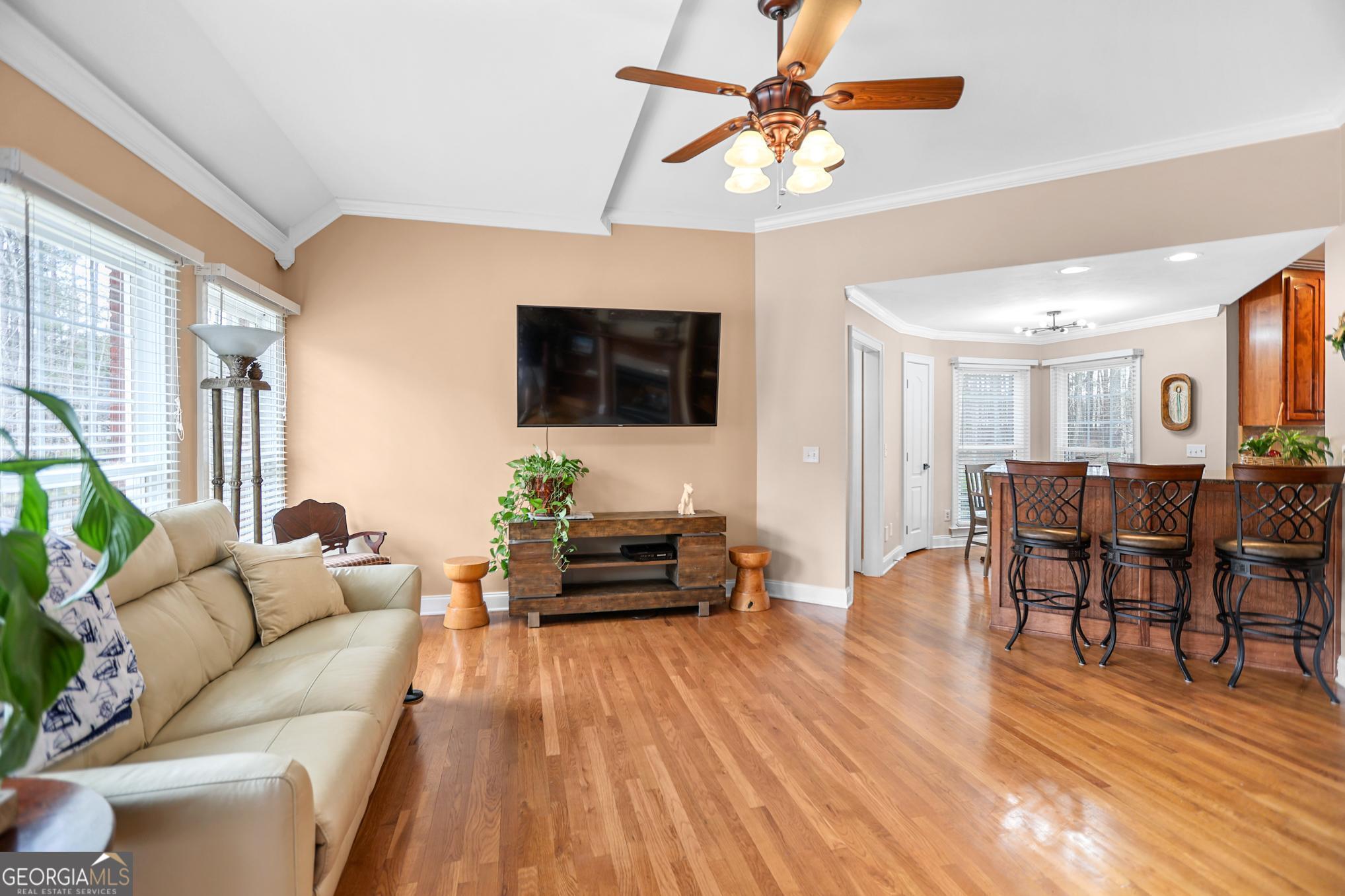 643 Old Greenville Road Fayetteville, GA 30215 - Photo 31 of 59 a living room with furniture and a flat screen tv
