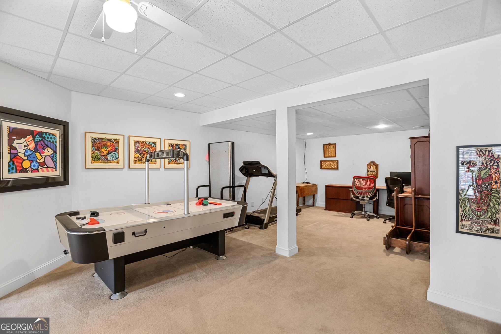 643 Old Greenville Road Fayetteville, GA 30215 - Photo 42 of 59 a playing room with furniture and a gym machine