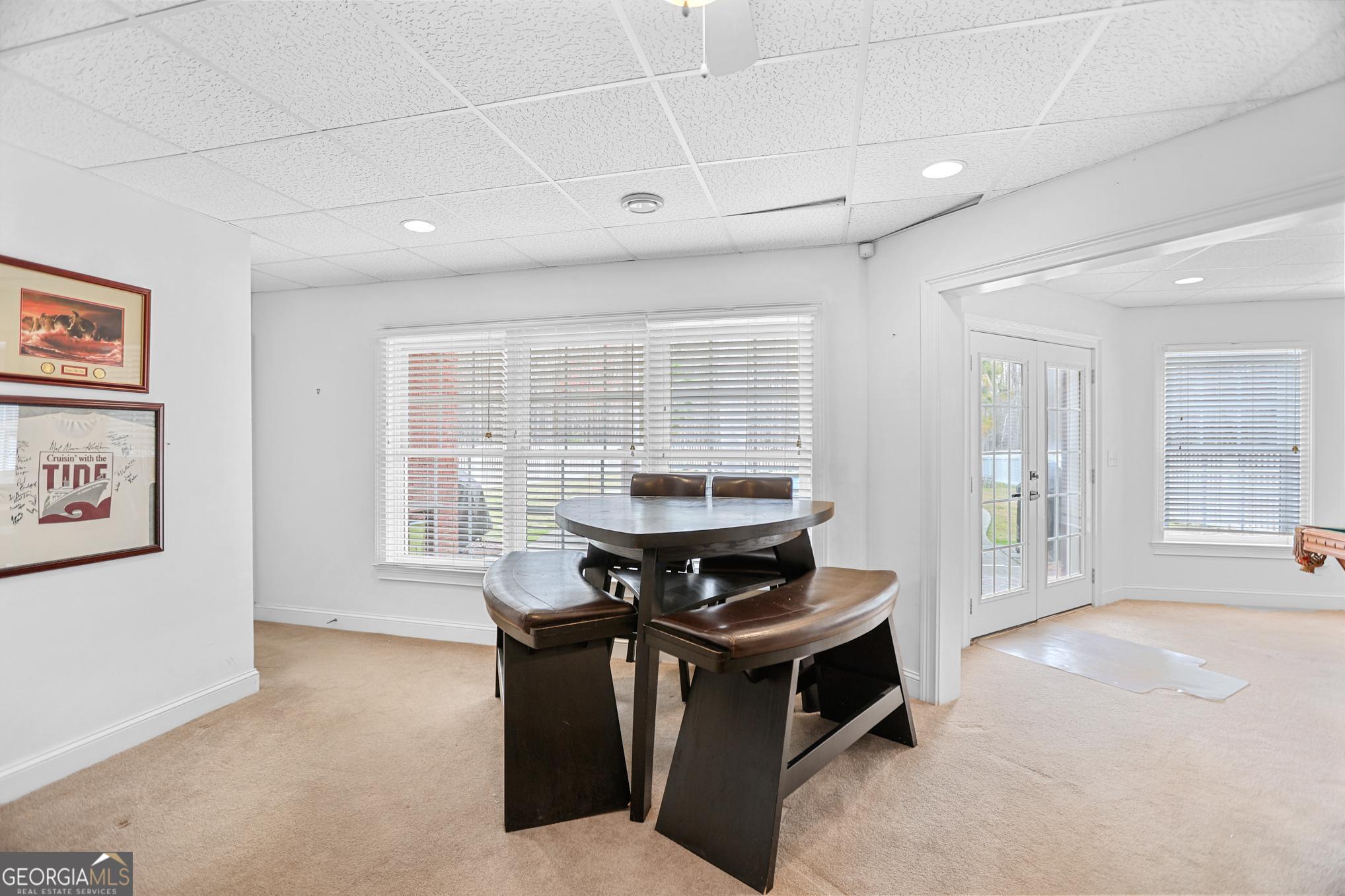 643 Old Greenville Road Fayetteville, GA 30215 - Photo 43 of 59 a living room with furniture and a window
