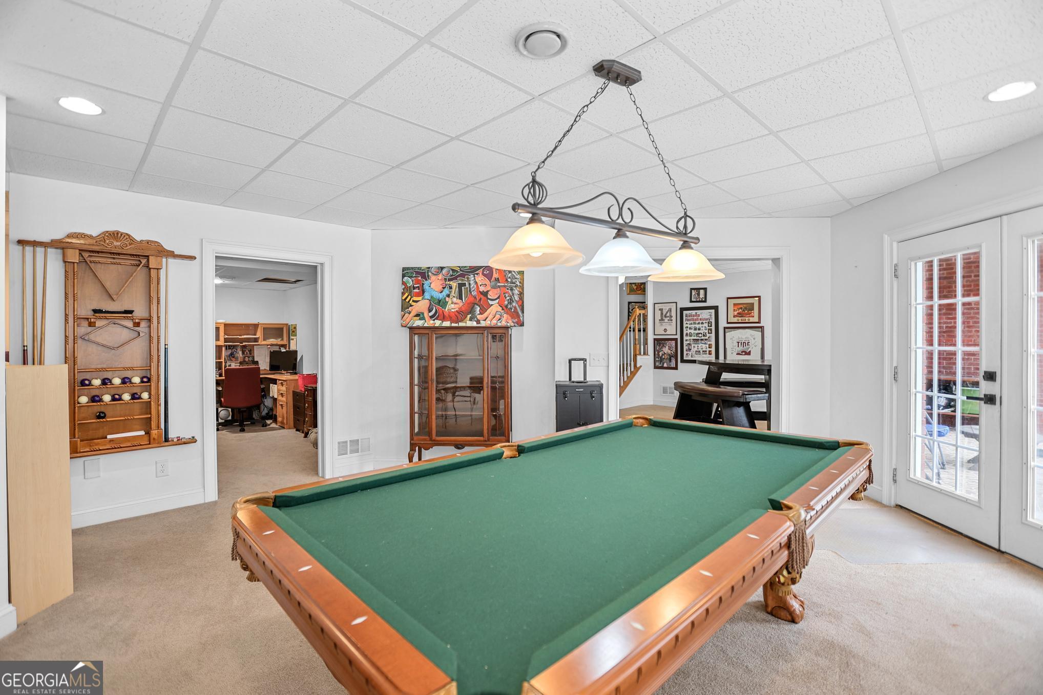 643 Old Greenville Road Fayetteville, GA 30215 - Photo 46 of 59 a room with pool table and windows
