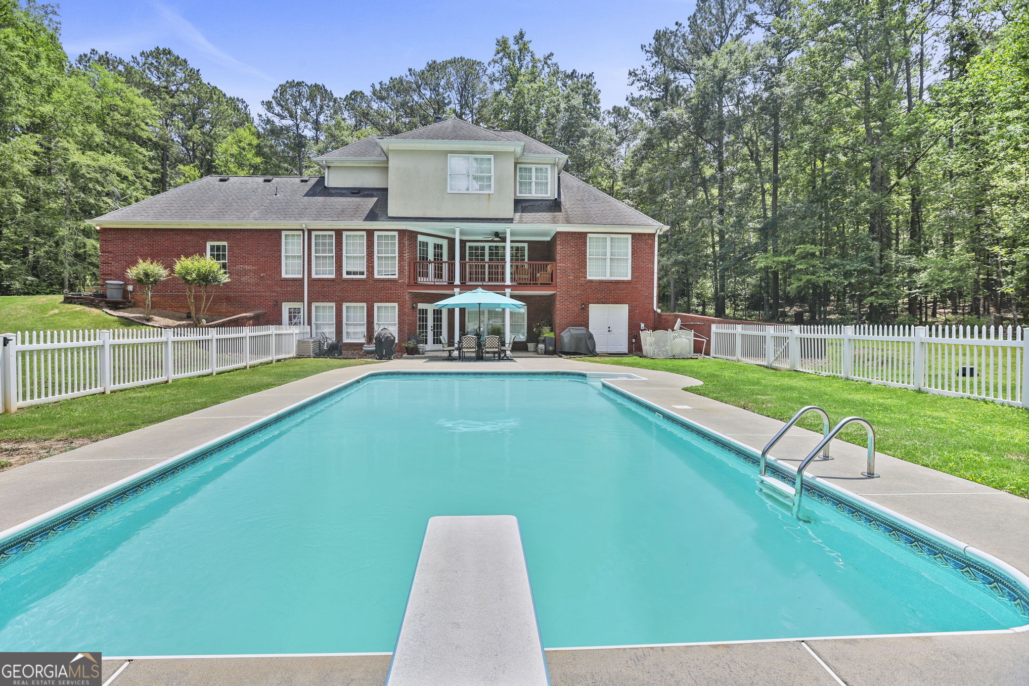 643 Old Greenville Road Fayetteville, GA 30215 - Photo 51 of 59 a front view of house with yard and green space