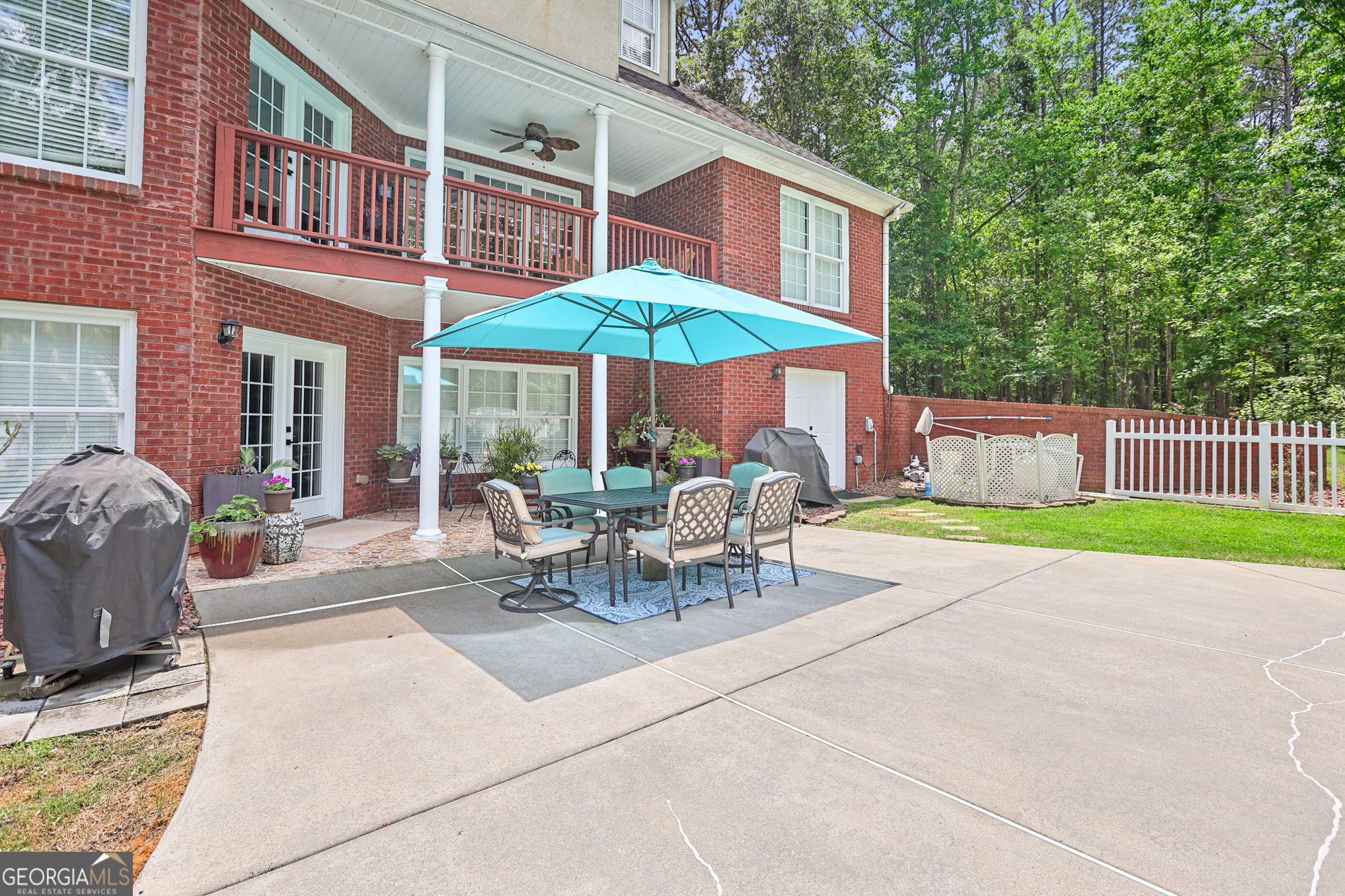 643 Old Greenville Road Fayetteville, GA 30215 - Photo 52 of 59 a view of a house with a yard and sitting area