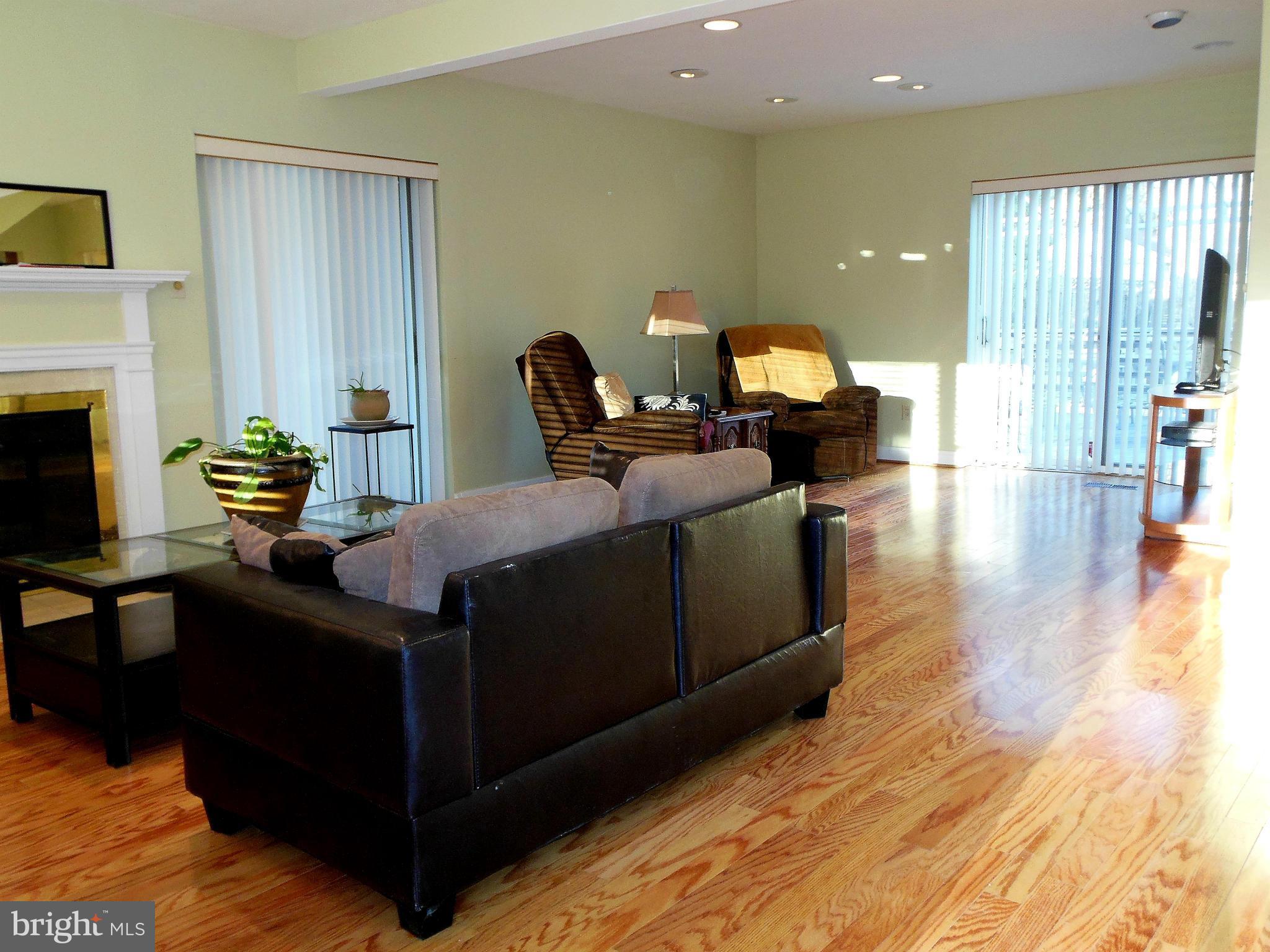 3619 Campfield Road Baltimore, MD 21207 - Photo 2 of 16 Open Living Area with Fireplace