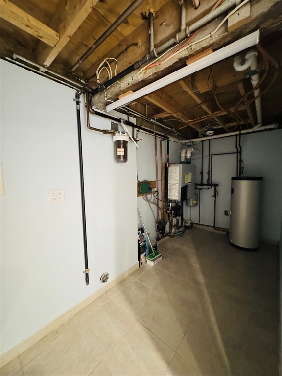 162 Palmer Street Quincy, MA 02169 - Photo 17 of 21 a view of a room with gym equipment