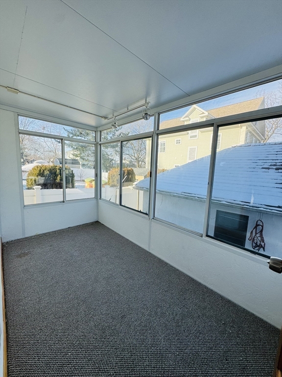 162 Palmer Street Quincy, MA 02169 - Photo 18 of 21 a view of an empty room with windows