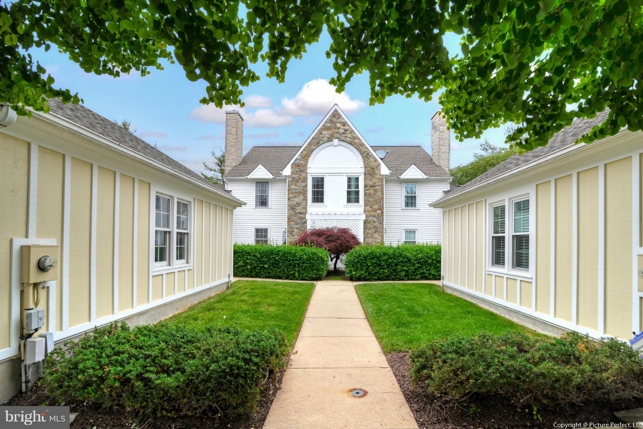 2488 Bear Den Road Frederick, MD 21701 - Photo 1 of 30 a front view of a house with yard and green space