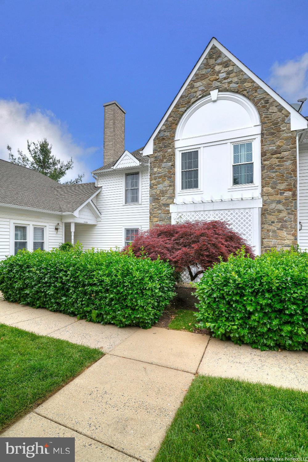 2488 Bear Den Road Frederick, MD 21701 - Photo 2 of 30 a front view of a house with a yard