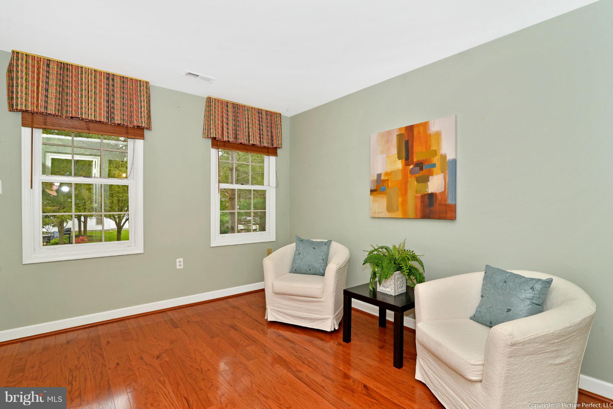 2488 Bear Den Road Frederick, MD 21701 - Photo 14 of 30 a living room with furniture and a window