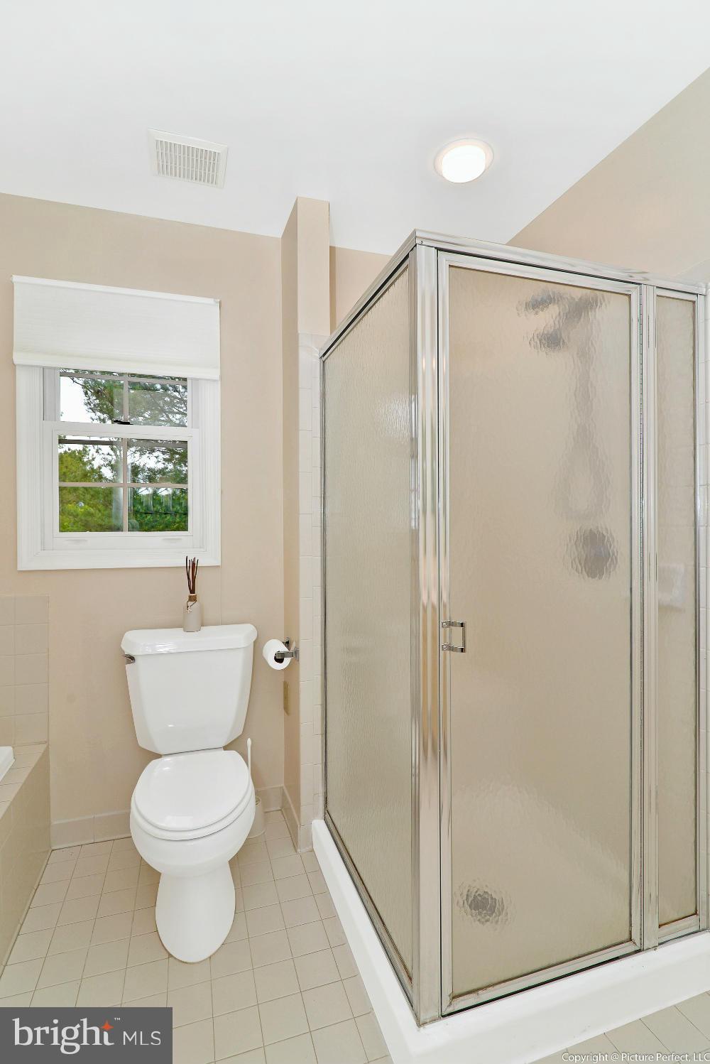 2488 Bear Den Road Frederick, MD 21701 - Photo 20 of 30 a bathroom with a toilet and a shower