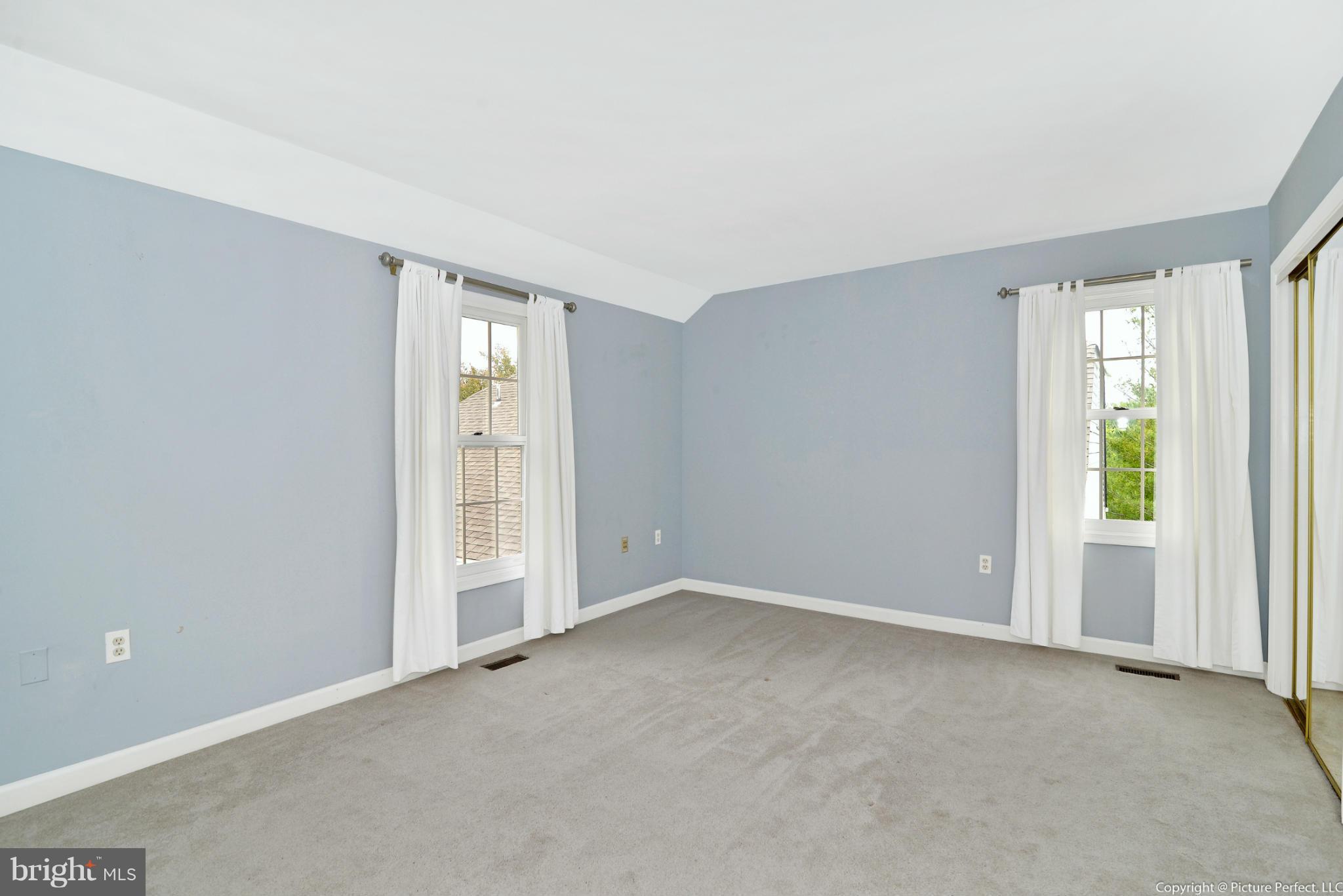 2488 Bear Den Road Frederick, MD 21701 - Photo 21 of 30 an empty room with windows and closet