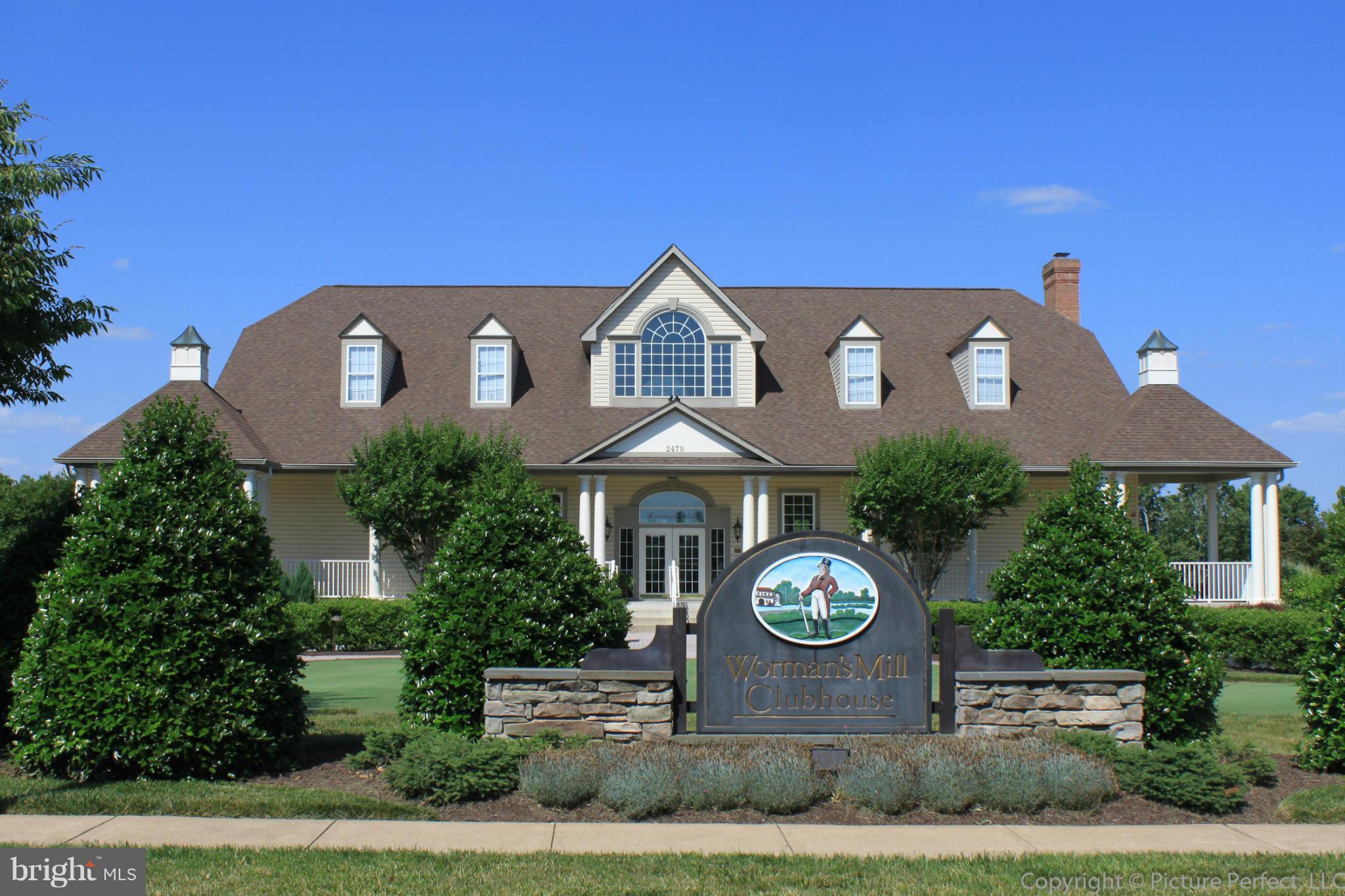 2488 Bear Den Road Frederick, MD 21701 - Photo 29 of 30 a front view of a house with garden space and yard
