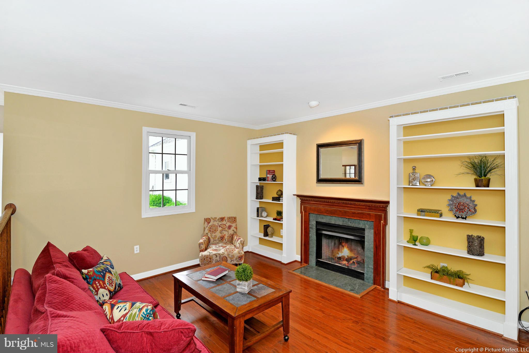 2488 Bear Den Road Frederick, MD 21701 - Photo 7 of 30 a living room with furniture fireplace and a window