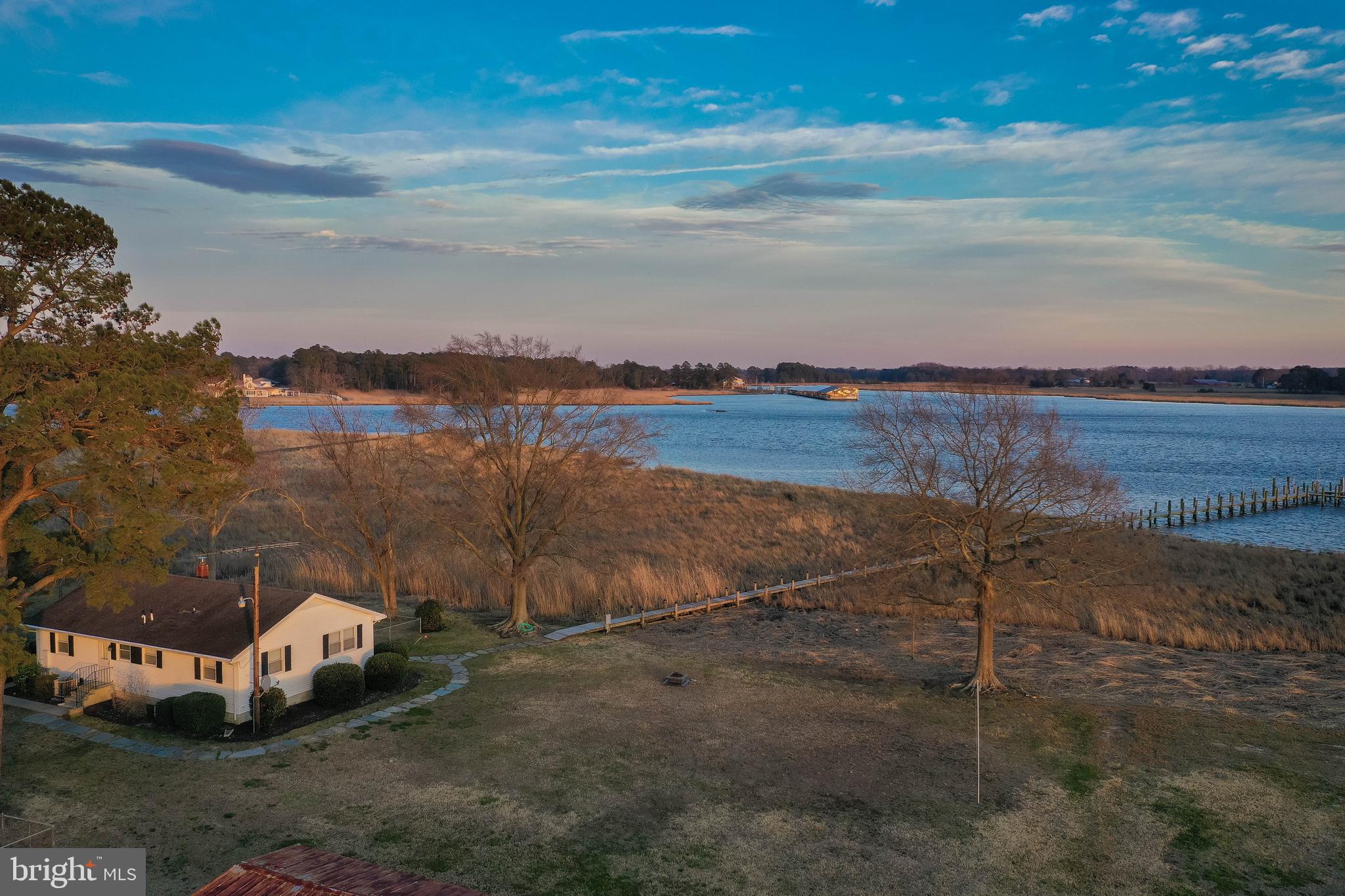 a view of a backyard of a house