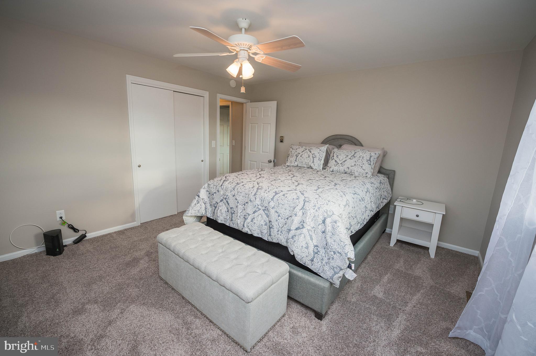 3555 Green Hill Church Road Quantico, MD 21856 - Photo 25 of 51 a living room with furniture and a chandelier