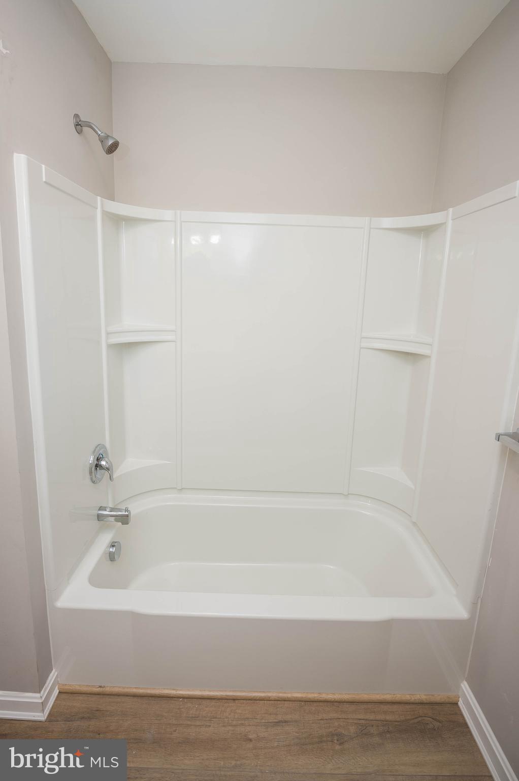 3555 Green Hill Church Road Quantico, MD 21856 - Photo 30 of 51 a bathroom with bathtub and shower