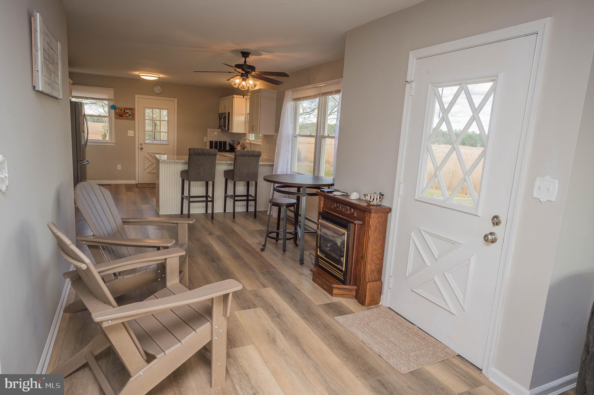 3555 Green Hill Church Road Quantico, MD 21856 - Photo 34 of 51 a view of a dining room with furniture window and wooden floor