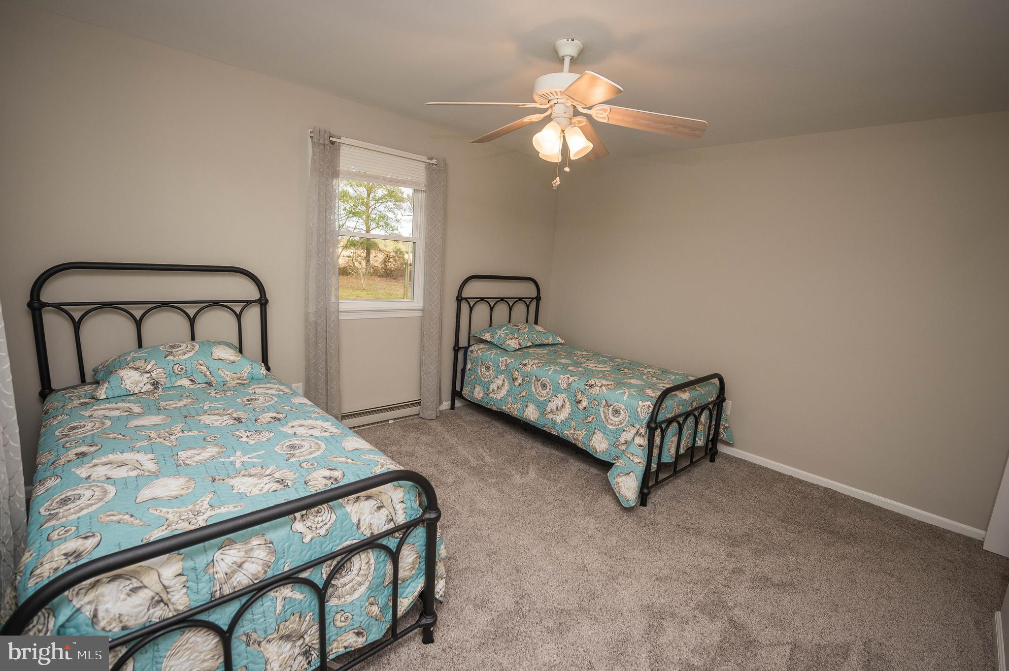 3555 Green Hill Church Road Quantico, MD 21856 - Photo 39 of 51 a bedroom with a bed mirror and window