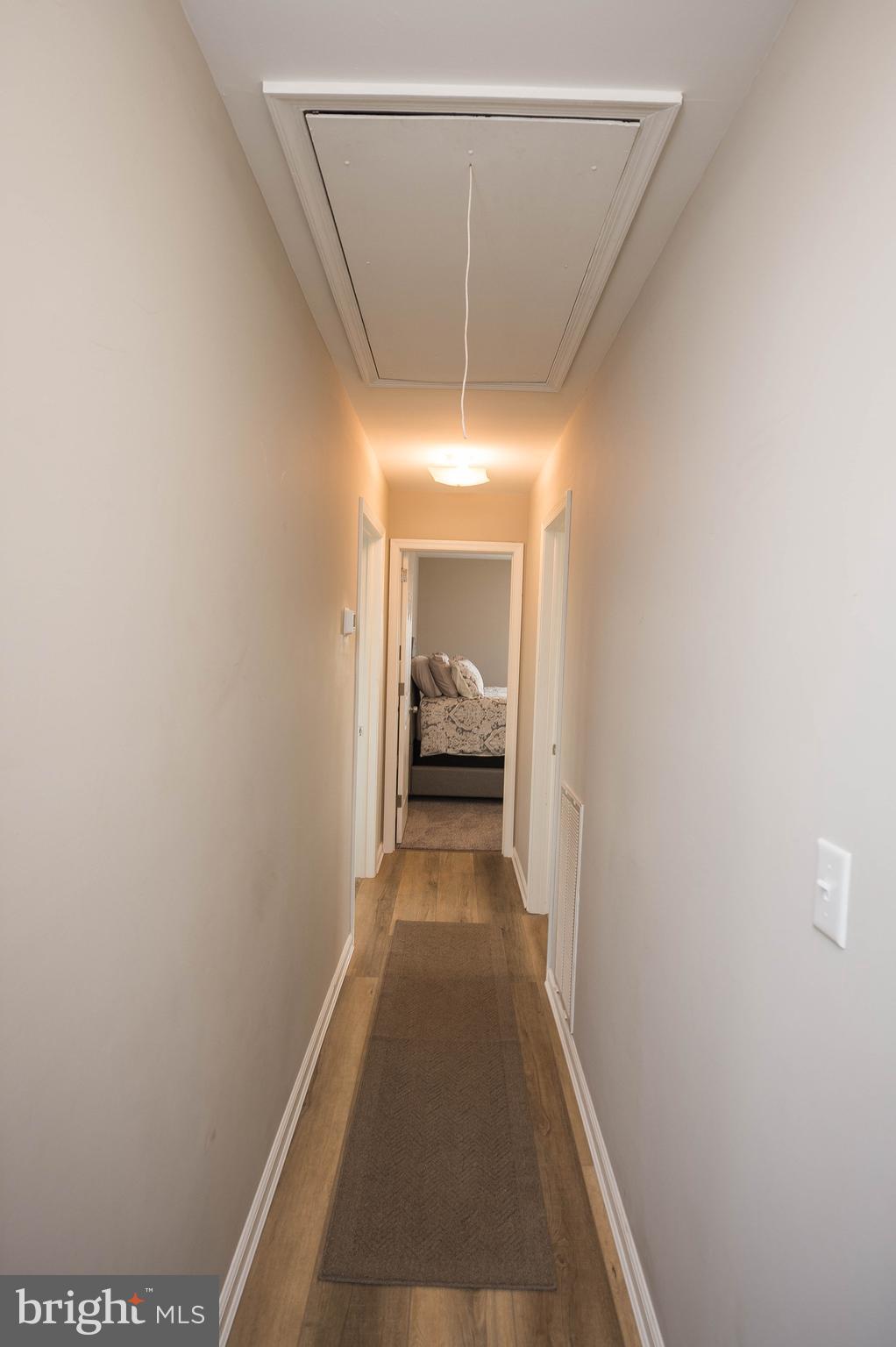 3555 Green Hill Church Road Quantico, MD 21856 - Photo 42 of 51 a view of a hallway with a chandelier