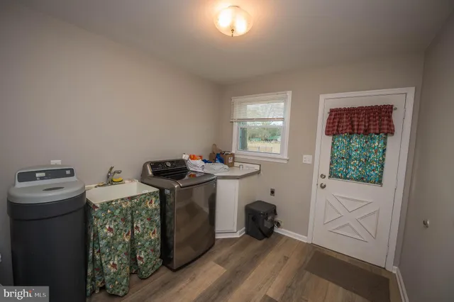 a utility room with dryer and washer