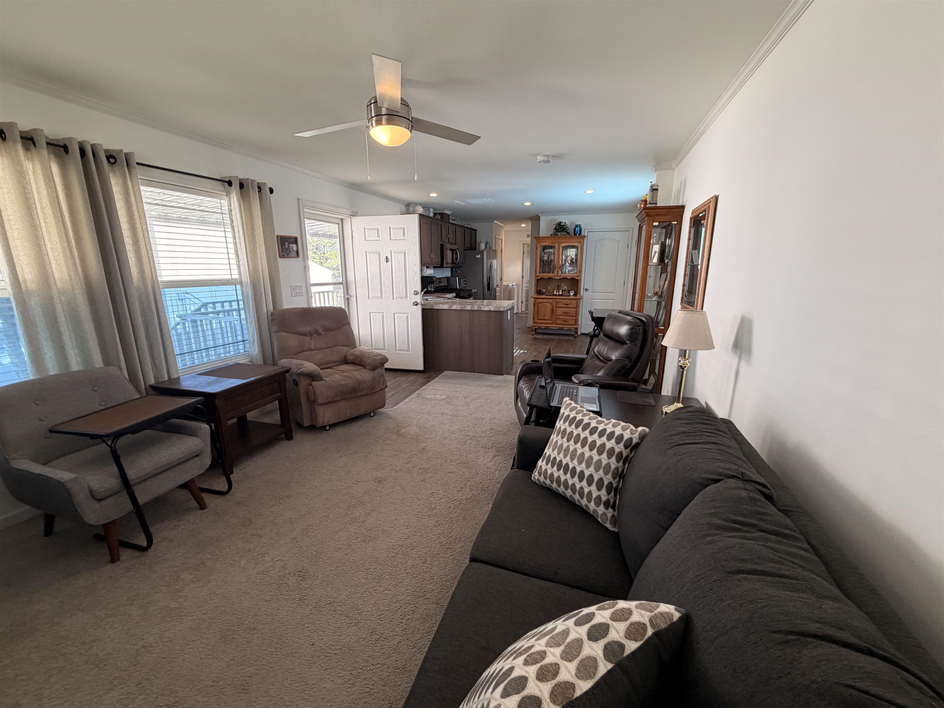 435 32 Road, Unit 826 Clifton, CO 81520 - Photo 3 of 17 a living room with furniture and a window