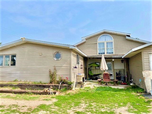 21374 Coleta Road Sterling, IL 61081 - Photo 1 of 19 a view of house with backyard