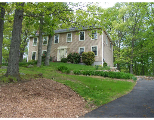 147 Parker Road Framingham, MA 01702 - Photo 1 of 12 a view of a house with yard and a tree