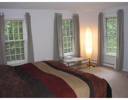 147 Parker Road Framingham, MA 01702 - Photo 12 of 12 a bedroom with a bed and a large window
