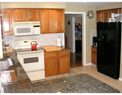147 Parker Road Framingham, MA 01702 - Photo 2 of 12 a utility room with closet dryer and washer