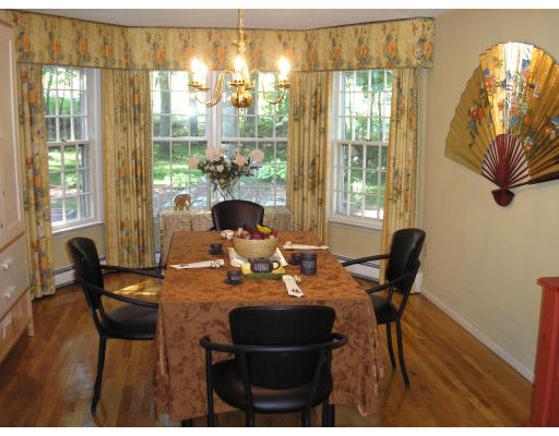 147 Parker Road Framingham, MA 01702 - Photo 3 of 12 a view of a dining room with furniture window and outside view
