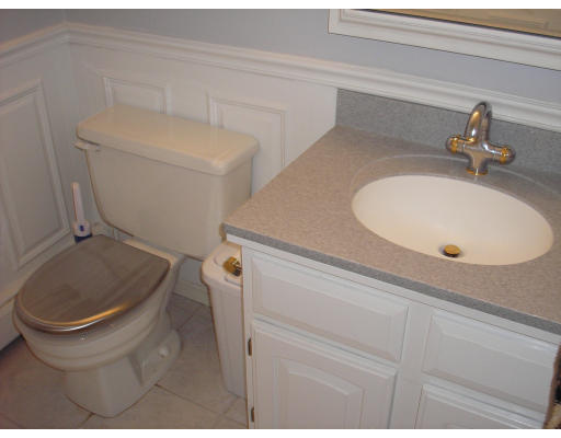 147 Parker Road Framingham, MA 01702 - Photo 8 of 12 a bathroom with a sink and a toilet