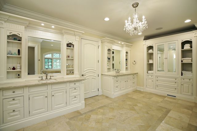 a kitchen with stainless steel appliances granite countertop a refrigerator a stove a sink dishwasher and wooden cabinets with wooden floor