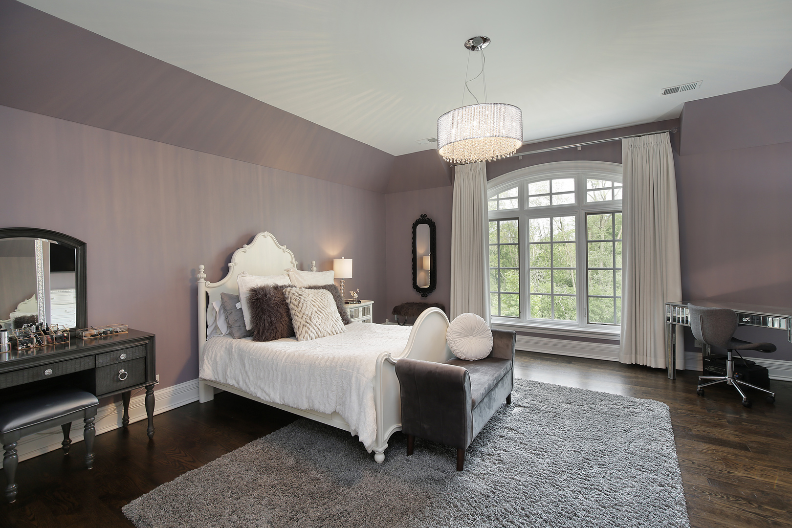 500 Voltz Road Northbrook, IL 60062 - Photo 20 of 35 a bedroom with a bed and a chandelier