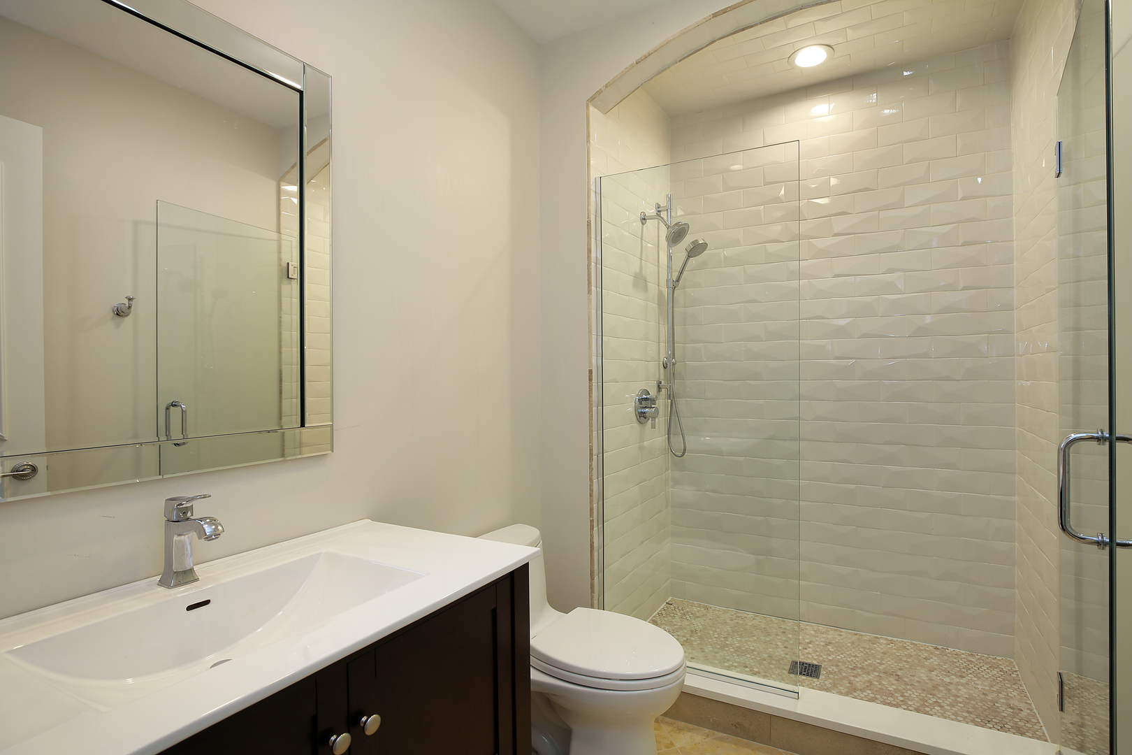 500 Voltz Road Northbrook, IL 60062 - Photo 22 of 35 a bathroom with a sink toilet a mirror and shower