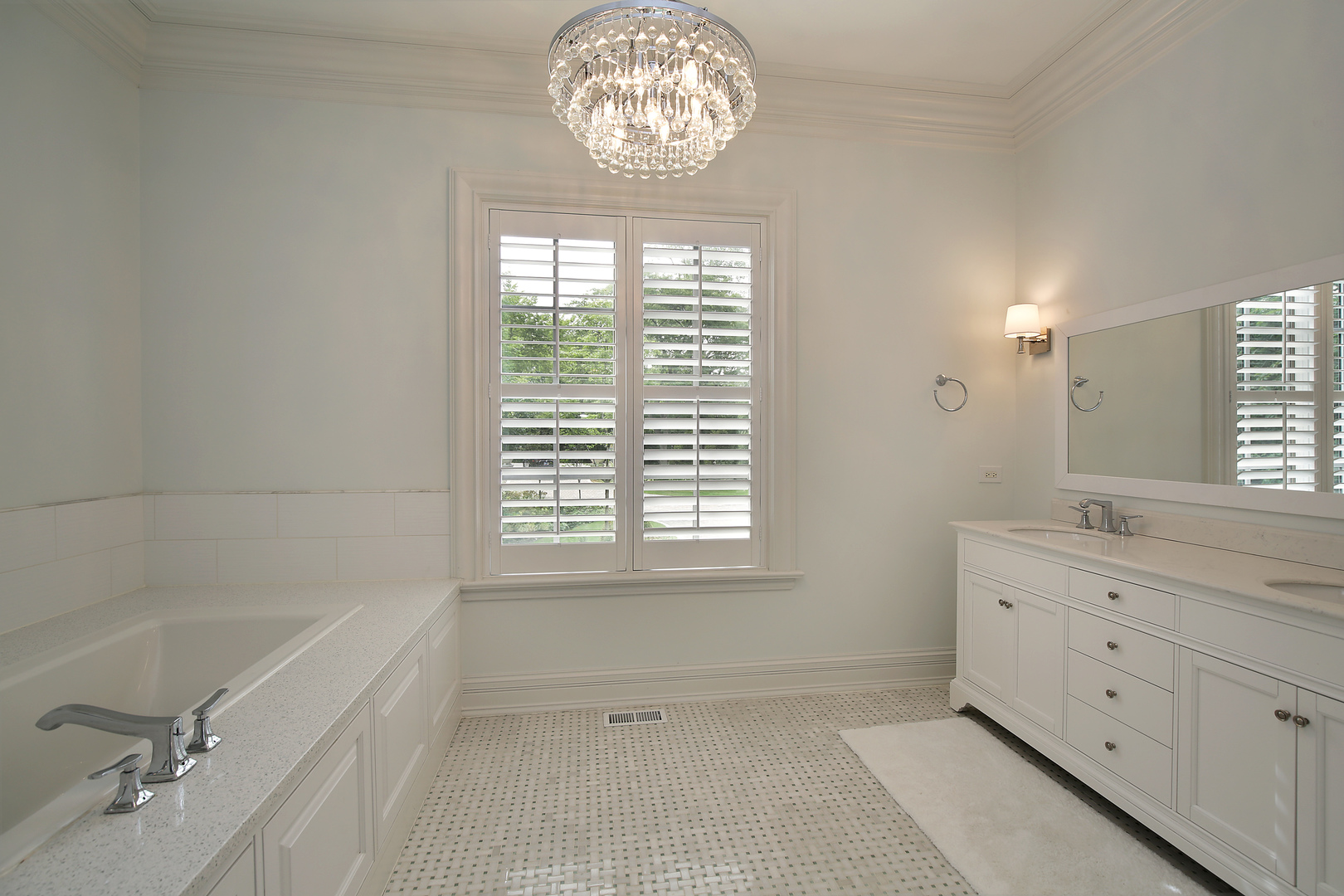 500 Voltz Road Northbrook, IL 60062 - Photo 25 of 35 a bathroom with a bathtub a sink and a large mirror