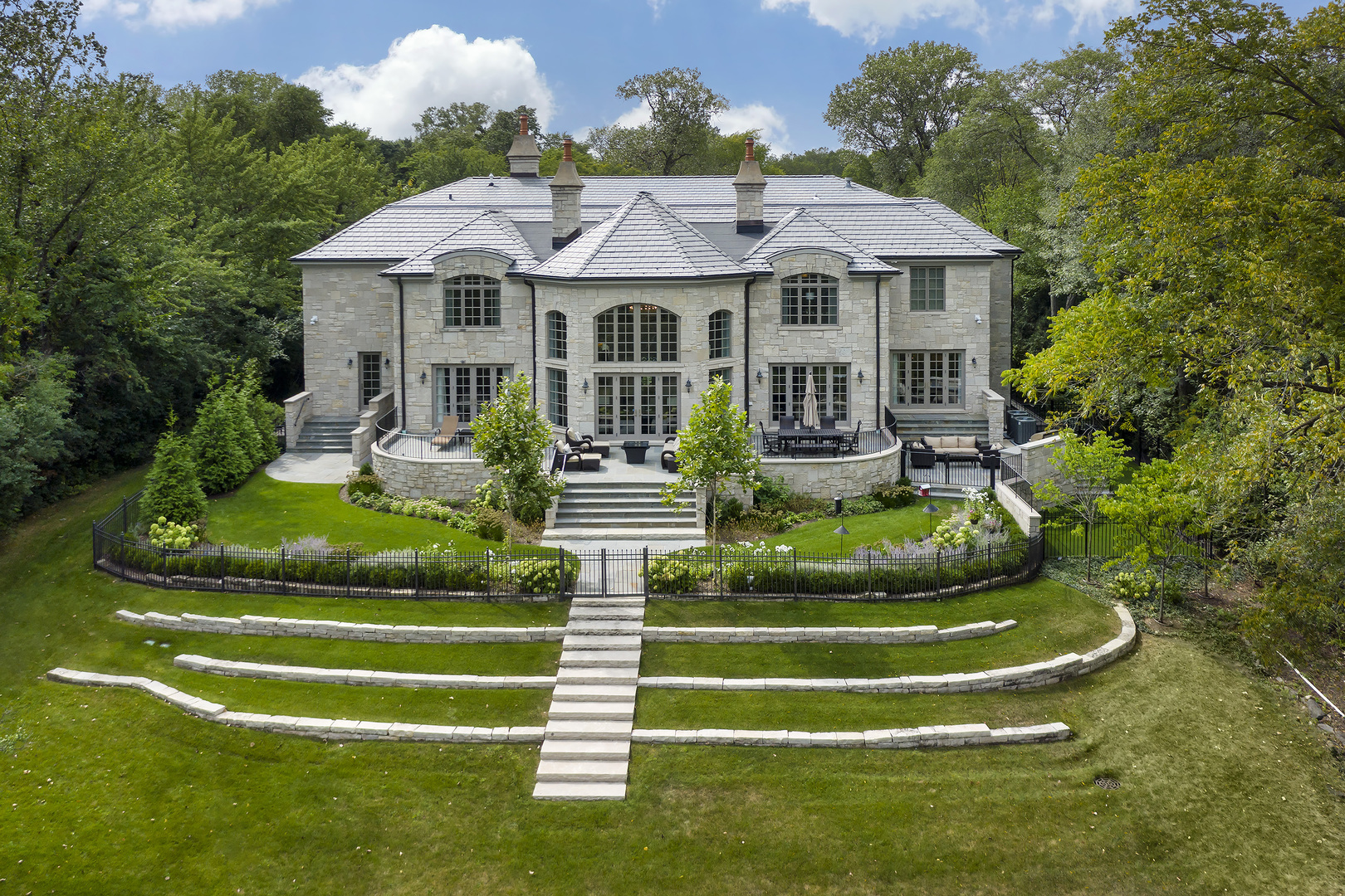 500 Voltz Road Northbrook, IL 60062 - Photo 33 of 35 a front view of a house with a yard table and chairs