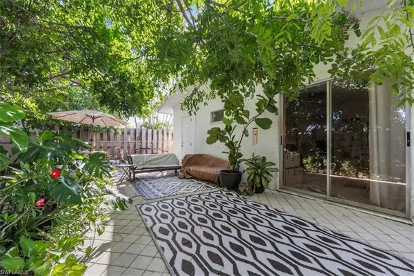 a view of a bench in a backyard