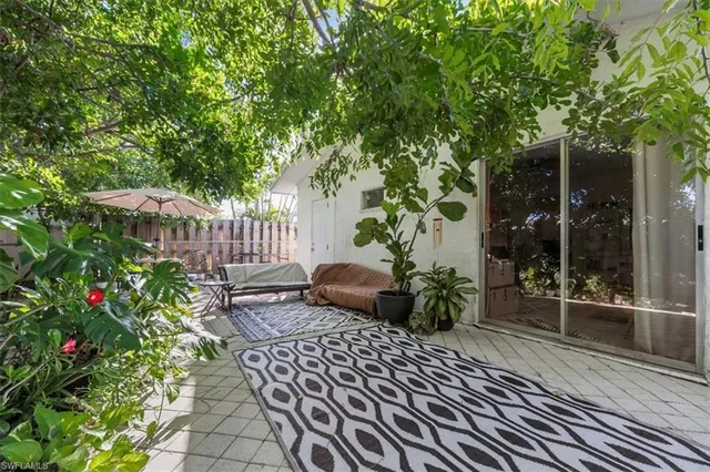 a view of a bench in a backyard