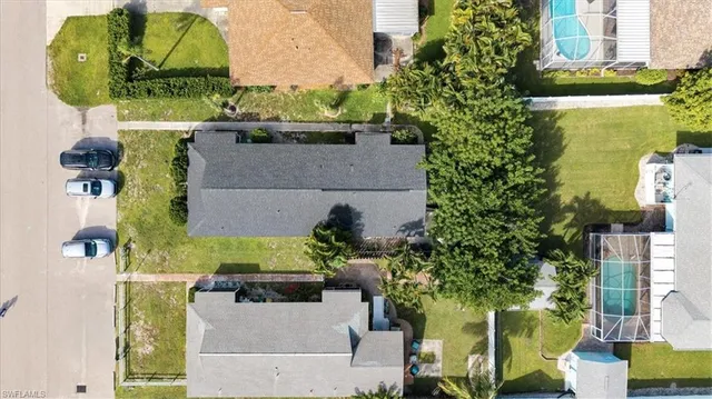 aerial view of a house with a swimming pool
