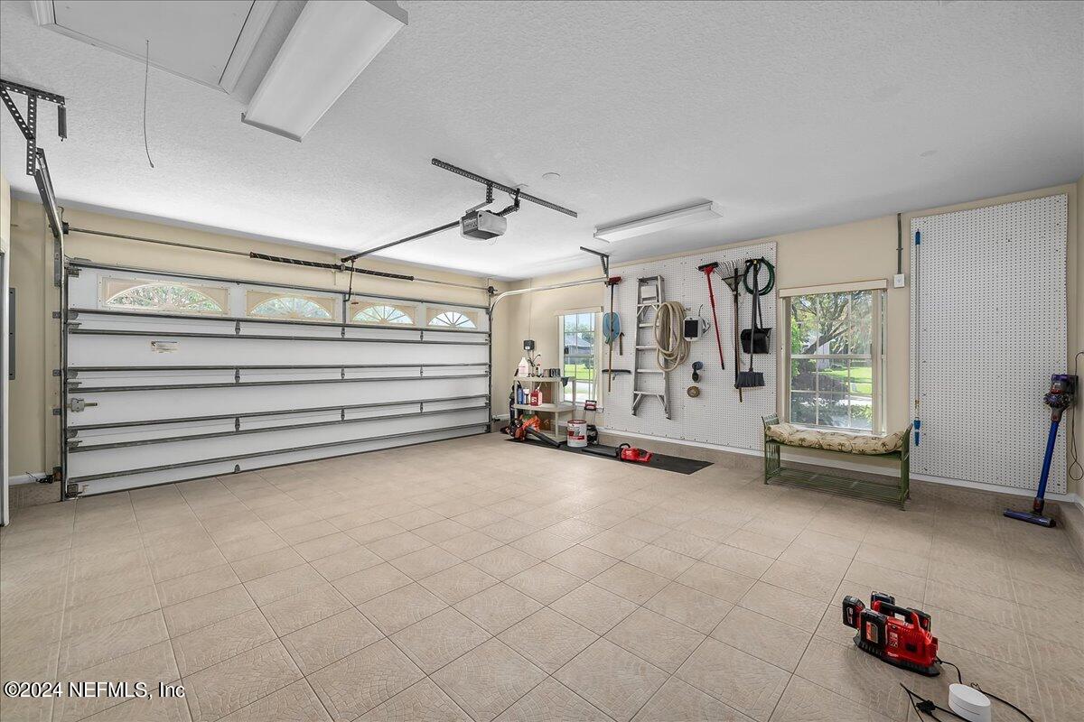 10285 Hamlet Glen Drive Jacksonville, FL 32221 - Photo 20 of 26 a view of a room with air conditioner and window