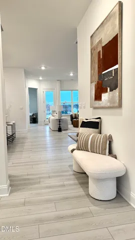 a living room with furniture fireplace and a fireplace