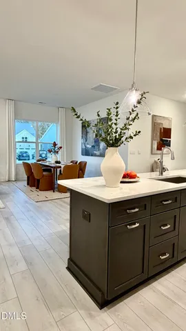 a bathroom with a double vanity sink mirror and double