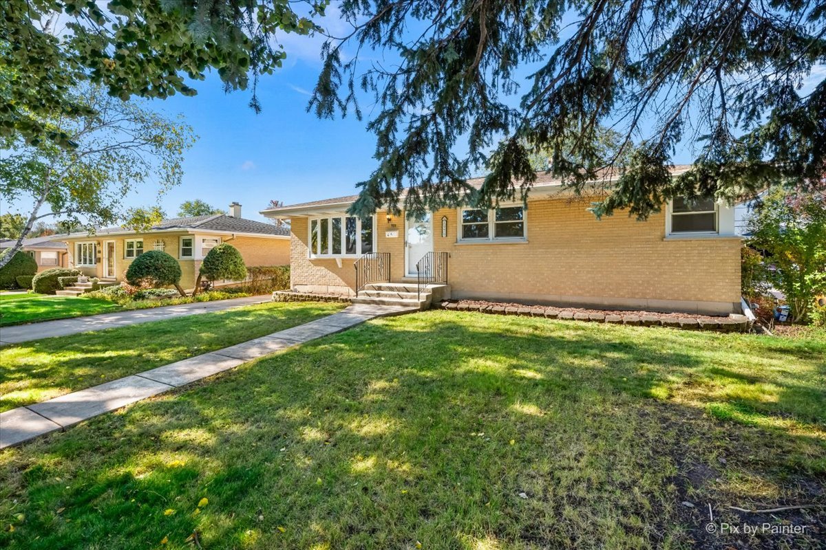 970 Fischer Drive Addison, IL 60101 - Photo 24 of 32 a view of a house with a big yard