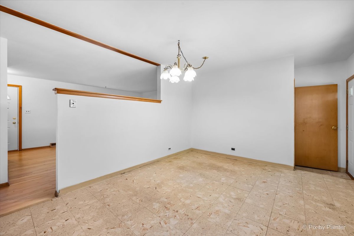 970 Fischer Drive Addison, IL 60101 - Photo 8 of 32 wooden floor in an empty room