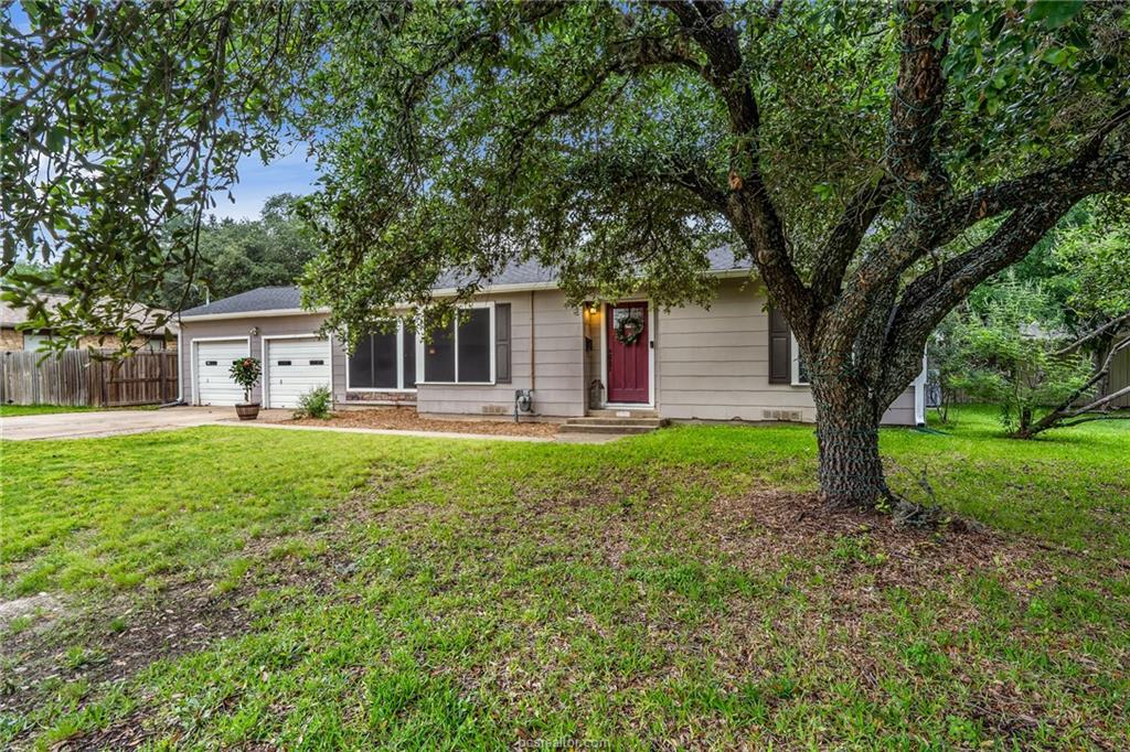 1414 East 29th Street Bryan, TX 77802 - Photo 2 of 21 a front view of house with yard and green space